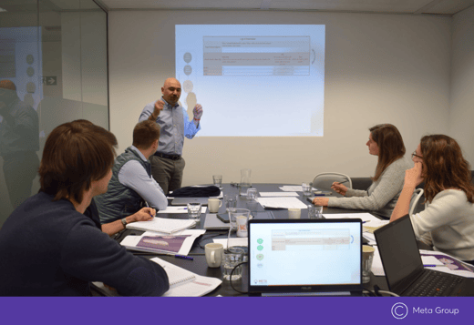 Man speaking to participants during Research Accelerator by Meta Group