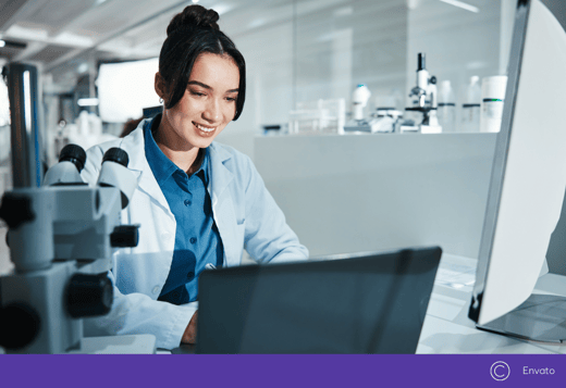 Woman working on laptop in lab, illustrating the EIT Health service